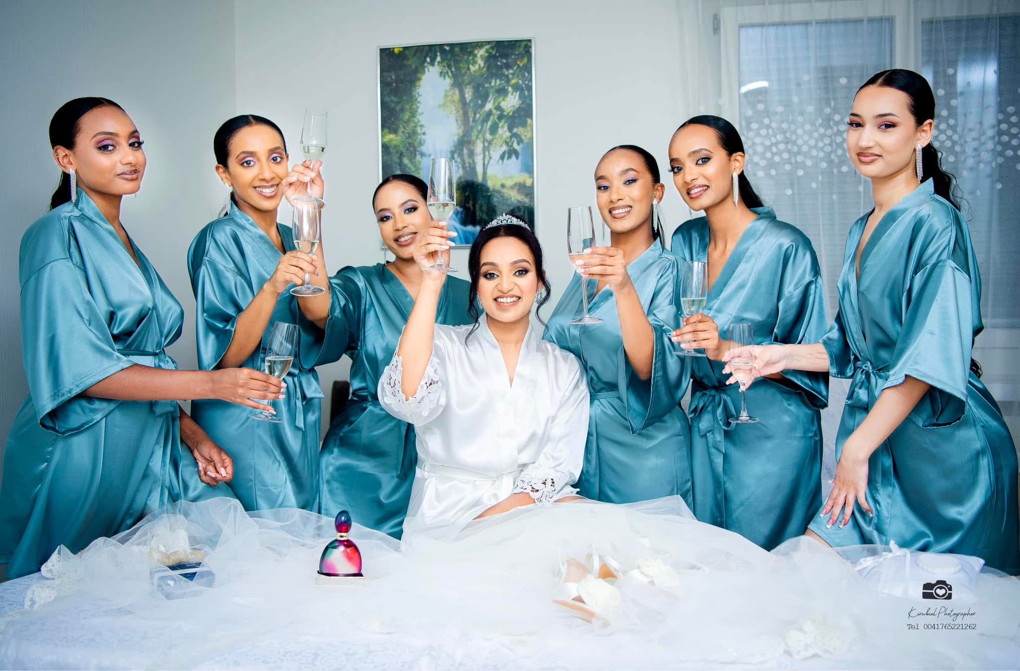 Bride and groom with black classic car